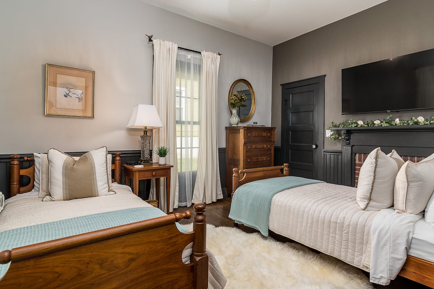 Bedroom with two twin beds and blue accents